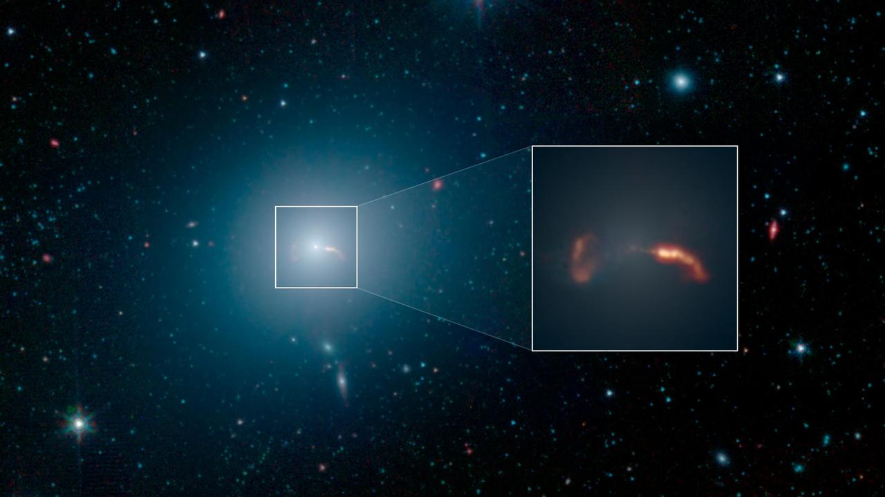 La galaxia M87 en infrarrojo vista por Spitzer, con el chorro que sale de su agujero negro central